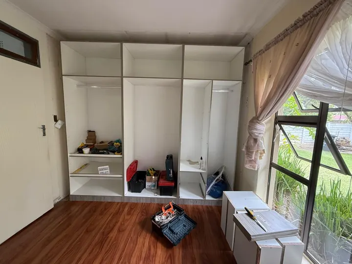 White wardrobe carcasses during installation